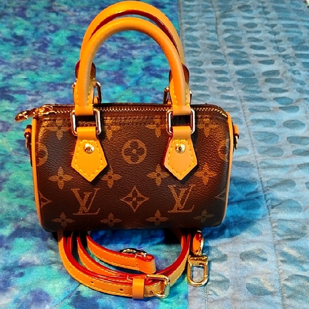 Adorable Brown Monogram Fashion Nano Bag NWOT